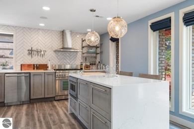 Walking distance to Downtown Charlevoix, this four-story - photo 13