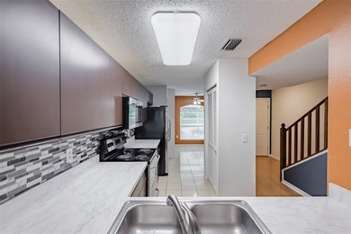 Welcome to this beautifully maintained two-story condo offering - photo 15