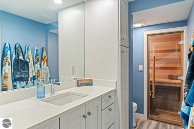 Walking distance to Downtown Charlevoix, this four-story - photo 42