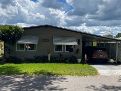 Lake Home For Sale in Zephyrhills, Florida