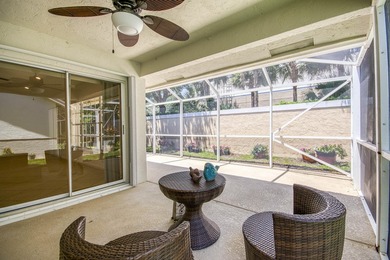Manicured landscaping and soaring vaulted ceilings welcome you - photo 12