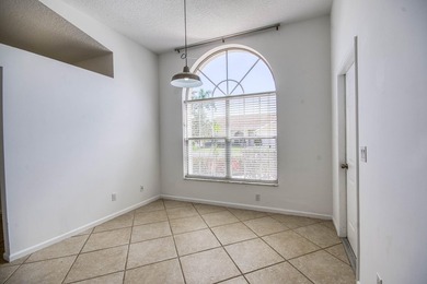 Manicured landscaping and soaring vaulted ceilings welcome you - photo 15