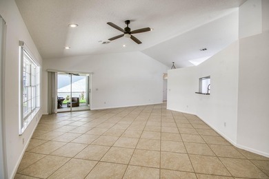 Manicured landscaping and soaring vaulted ceilings welcome you - photo 19