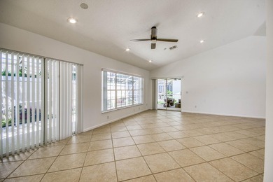 Manicured landscaping and soaring vaulted ceilings welcome you - photo 20