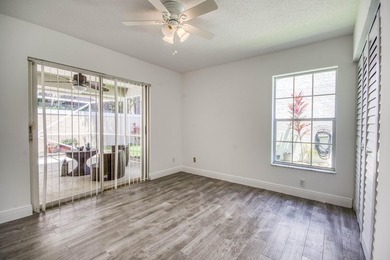 Manicured landscaping and soaring vaulted ceilings welcome you - photo 22