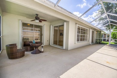 Manicured landscaping and soaring vaulted ceilings welcome you - photo 26