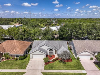 Manicured landscaping and soaring vaulted ceilings welcome you - photo 28