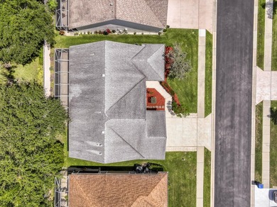 Manicured landscaping and soaring vaulted ceilings welcome you - photo 32