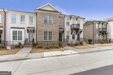 Welcome to this beautifully upgraded three-level townhouse
