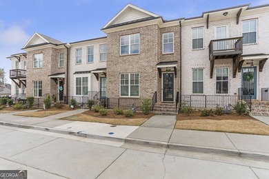 Welcome to this beautifully upgraded three-level townhouse