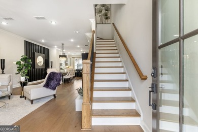 Welcome to this beautifully upgraded three-level townhouse