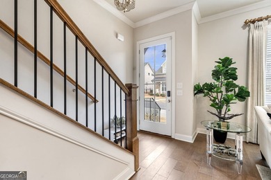 Welcome to this beautifully upgraded three-level townhouse