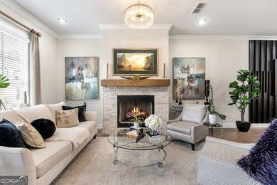 Welcome to this beautifully upgraded three-level townhouse