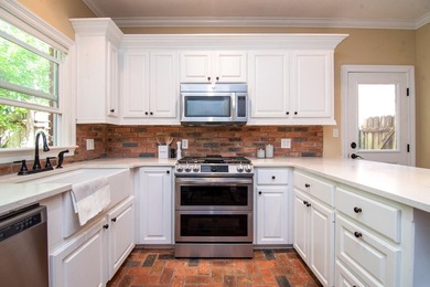 Welcome to this beautiful Canebrake garden home featuring a - photo 17