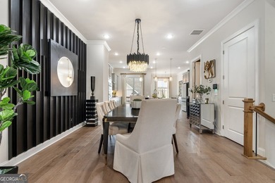 Welcome to this beautifully upgraded three-level townhouse