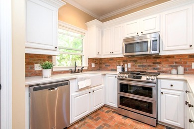 Welcome to this beautiful Canebrake garden home featuring a - photo 18