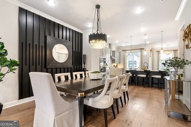 Welcome to this beautifully upgraded three-level townhouse