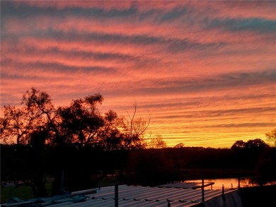 DISCOVER WATERFRONT LIVING IN THE DESIRABLE BUCKEYE KNOLL &