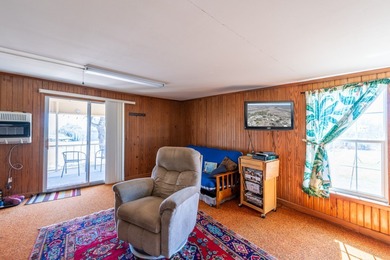 DISCOVER WATERFRONT LIVING IN THE DESIRABLE BUCKEYE KNOLL &