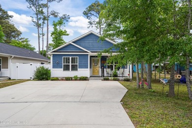 COASTAL COTTAGE. OPEN FLOORPLAN. DIRECT BEACH ACCESS. This - photo 3