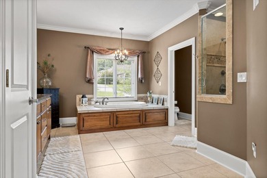 Experience luxury living in this beautiful custom built home - photo 28