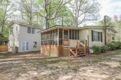 Check out this Lake Sinclair home overlooking peaceful water - photo 2