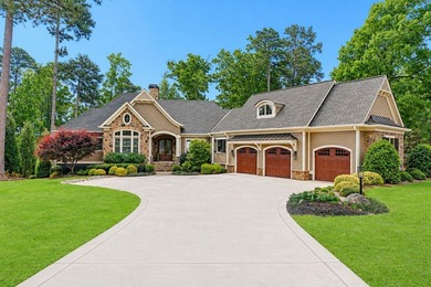 LIKE NEW CUSTOM HOME POSITIONED ALONG THE 11TH HOLE OF THE CREEK - photo 2