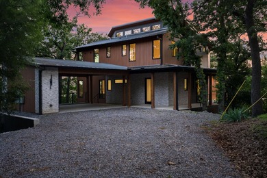 Experience a new level of lakeside living in the exclusive - photo 2