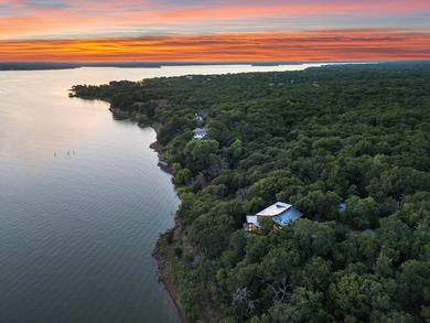 Experience a new level of lakeside living in the exclusive - photo 4
