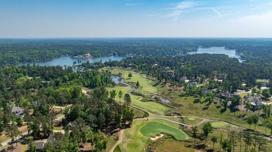 LIKE NEW CUSTOM HOME POSITIONED ALONG THE 11TH HOLE OF THE CREEK - photo 5