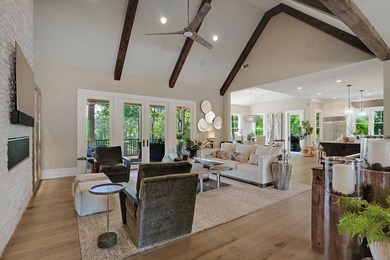 LIKE NEW CUSTOM HOME POSITIONED ALONG THE 11TH HOLE OF THE CREEK - photo 8