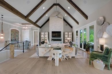 LIKE NEW CUSTOM HOME POSITIONED ALONG THE 11TH HOLE OF THE CREEK - photo 10