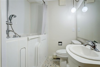 Conveniently located near Lake Ontario, this spacious 3-bedroom - photo 15