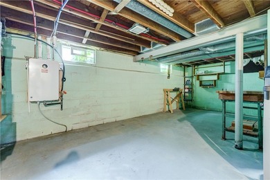 Conveniently located near Lake Ontario, this spacious 3-bedroom - photo 23