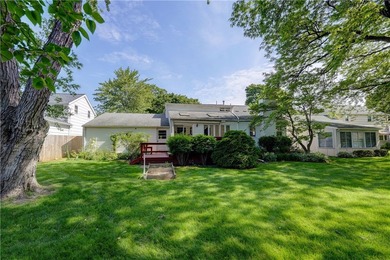 Conveniently located near Lake Ontario, this spacious 3-bedroom - photo 24