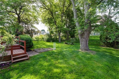 Conveniently located near Lake Ontario, this spacious 3-bedroom - photo 25