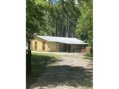 The Perfect Getaway With A Huge Covered Boatslip - Lake Home For Sale in Pachuta, Mississippi