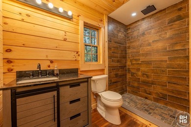 Lake Placid custom new completed log home is being offered for - photo 13