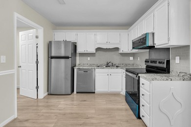 Welcome to this beautifully renovated 2-bedroom, 1.5-bath - photo 15