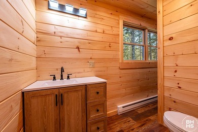 Lake Placid custom new completed log home is being offered for - photo 17
