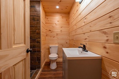Lake Placid custom new completed log home is being offered for - photo 22