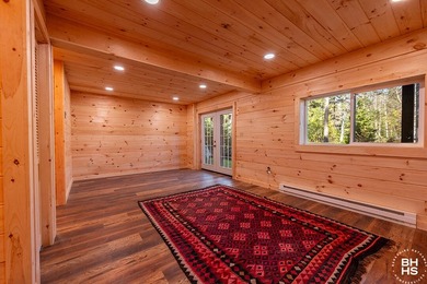 Lake Placid custom new completed log home is being offered for - photo 24