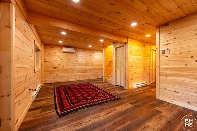 Lake Placid custom new completed log home is being offered for - photo 25