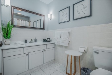 This meticulously remodeled townhouse blends timeless design - photo 25