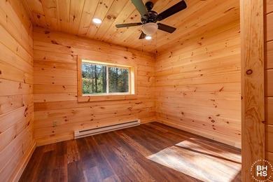 Lake Placid custom new completed log home is being offered for - photo 26
