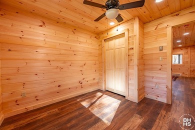 Lake Placid custom new completed log home is being offered for - photo 27