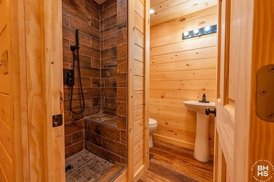 Lake Placid custom new completed log home is being offered for - photo 28