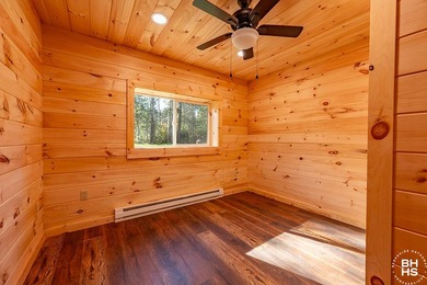 Lake Placid custom new completed log home is being offered for - photo 29