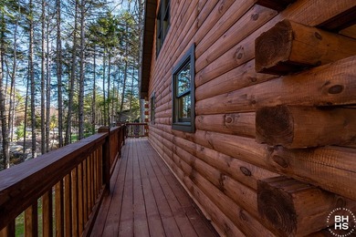 Lake Placid custom new completed log home is being offered for - photo 31