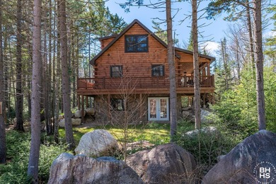 Lake Placid custom new completed log home is being offered for - photo 37